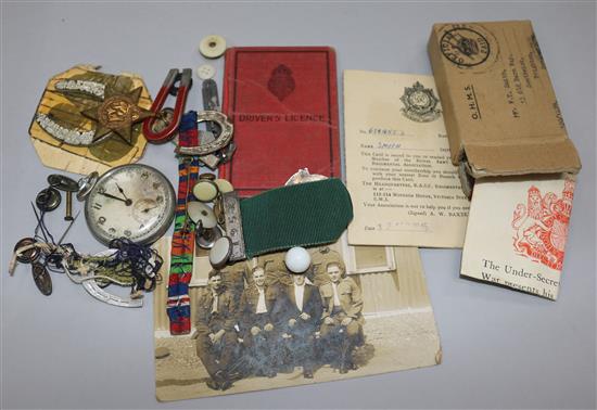 A Burmese medal, an officers watch, etc.